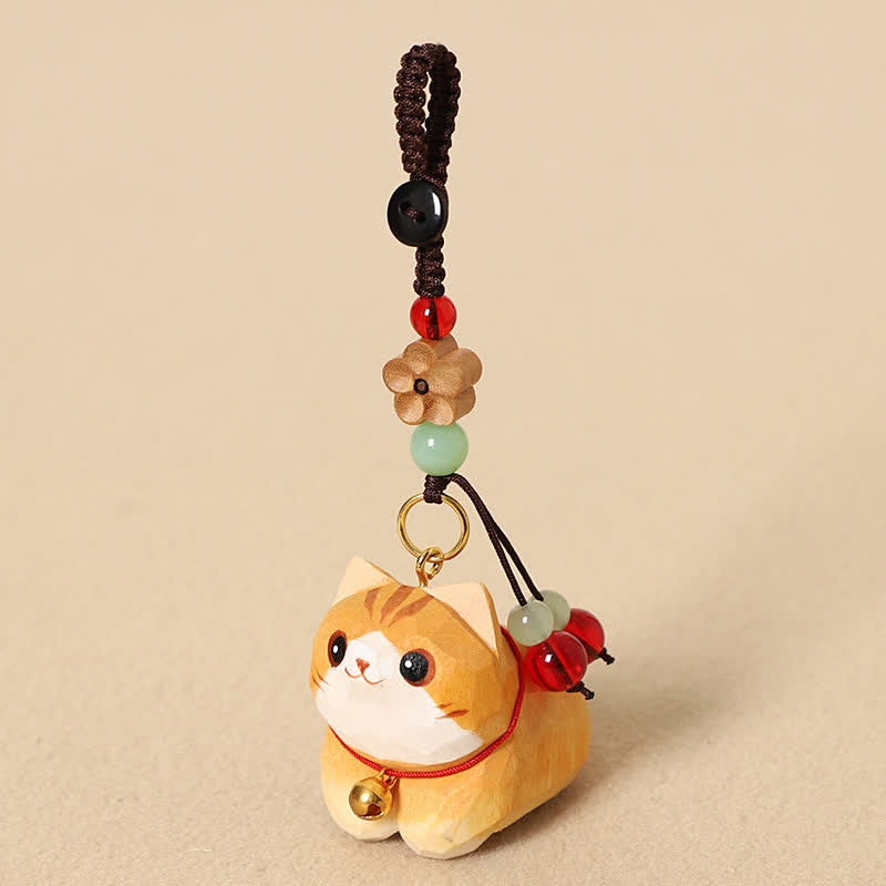 Buddha Stones Porte-clés de paix Om Mani Padme Hum en bois naturel sculpté à la main représentant un chat couché - Orange Cat Prunier Fleur - image 0