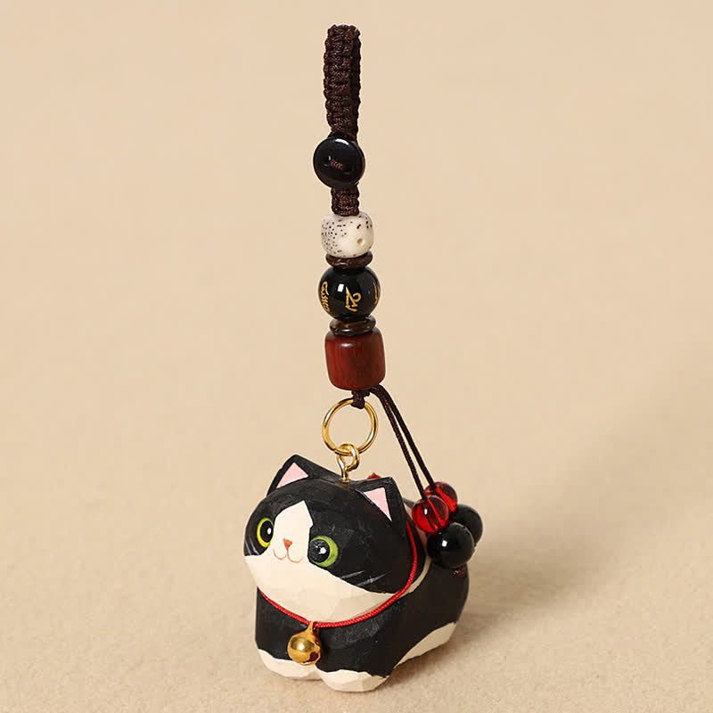 Buddha Stones Porte-clés de paix Om Mani Padme Hum en bois naturel sculpté à la main représentant un chat couché - Chat Noir Om Mani Padmé Hum - image 7