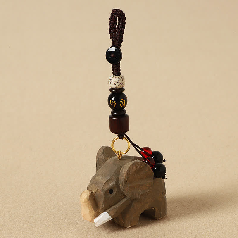 Buddha Stones Porte-clés Éléphant en bois naturel, symbole de paix, Om Mani Padme Hum et de pureté - Éléphant Om Mani Padme Hum - image 0