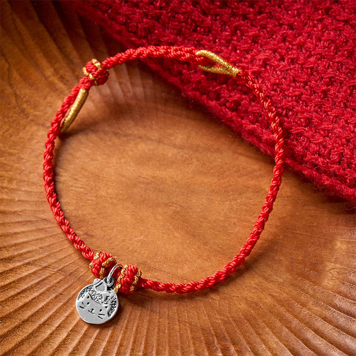 Buddha Stones Bracelet tressé rouge et noir en argent sterling 925 avec pendentif rond représentant un chaton mangeant du poisson, symbole de prospérité. - image 2