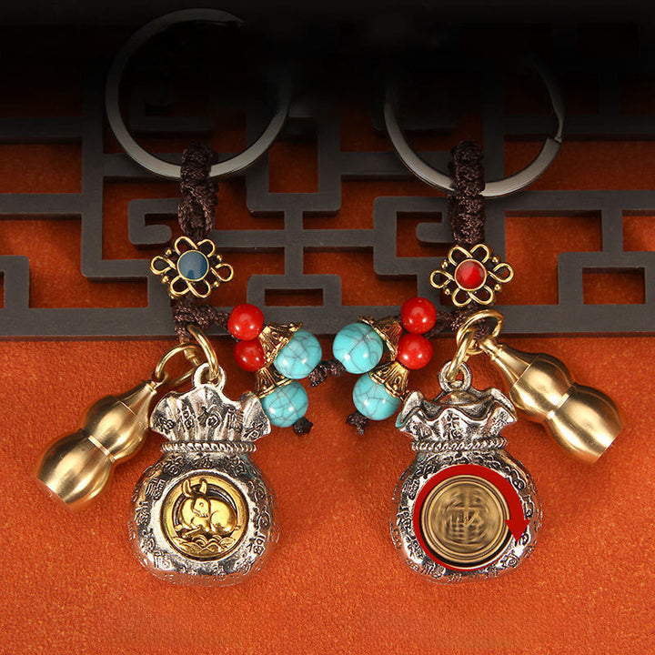 Buddha Stones Porte-clés tressés en forme de sac de fortune rotatif du zodiaque chinois - image 10