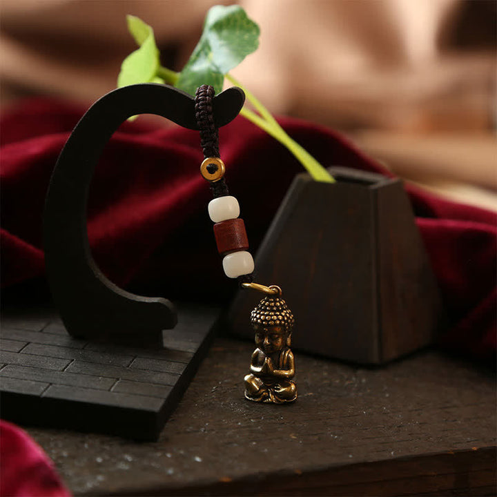 Buddha Stones Porte-clés en laiton avec Bouddha, cinq pièces d'empereur et cordon tressé, symbole de compassion - image 4