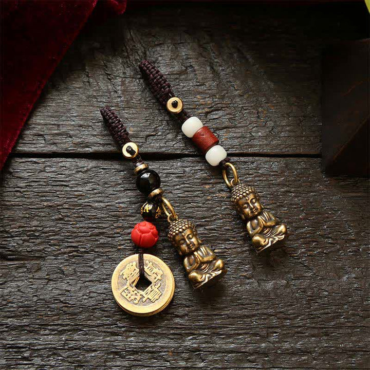 Buddha Stones Porte-clés en laiton avec Bouddha, cinq pièces d'empereur et cordon tressé, symbole de compassion - image 0
