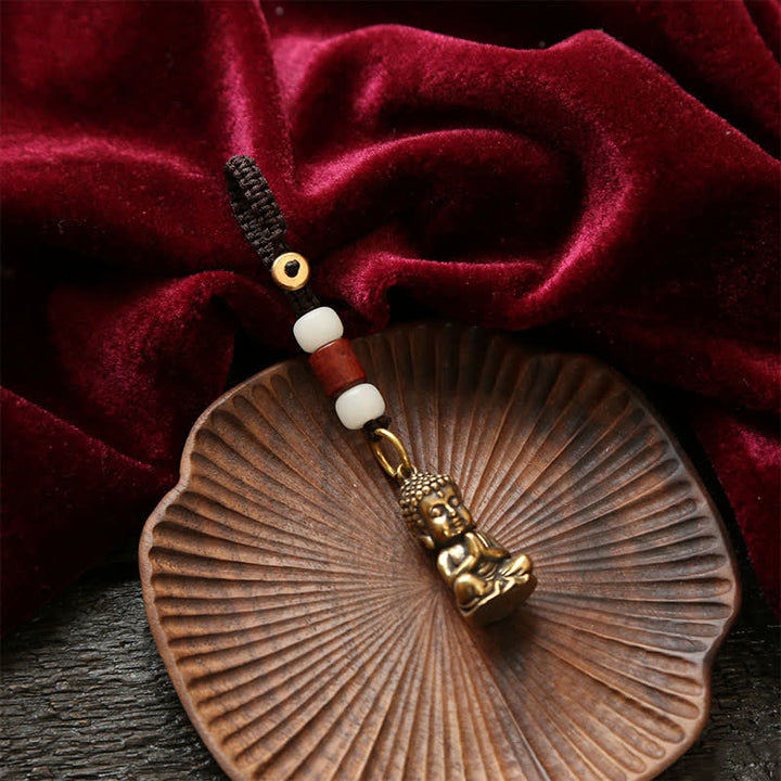 Buddha Stones Porte-clés en laiton avec Bouddha, cinq pièces d'empereur et cordon tressé, symbole de compassion - image 3