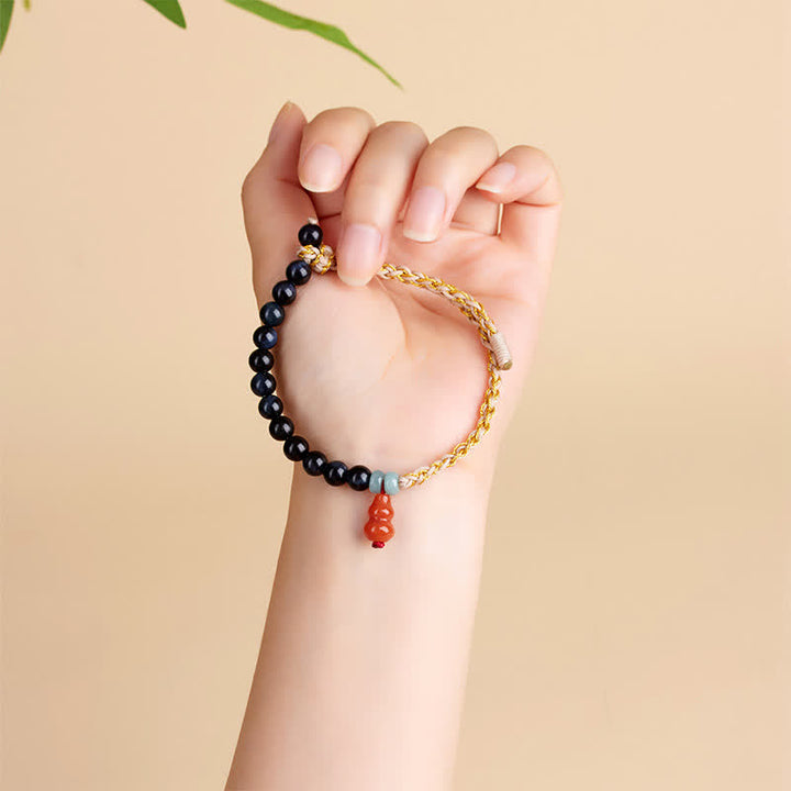 Buddha Stones Bracelet de force en calebasse tissée à la main avec œil de tigre bleu - image 4