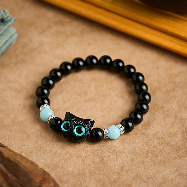 Buddha Stones Bracelet de protection en perles d'obsidienne noire avec un adorable chat aux grands yeux - image 18