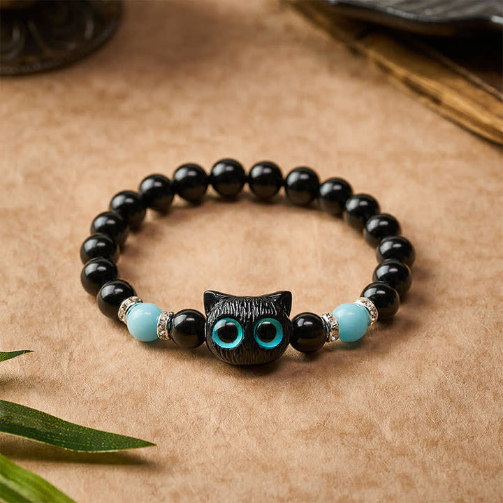 Buddha Stones Bracelet de protection en perles d'obsidienne noire avec un adorable chat aux grands yeux - image 14