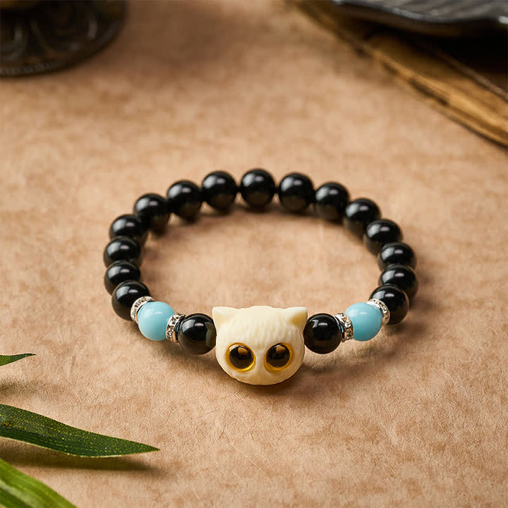 Buddha Stones Bracelet en obsidienne noire sculptée à la main avec perles en relief représentant un chat aux grands yeux - image 16