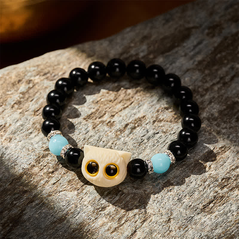 Buddha Stones Bracelet en obsidienne noire sculptée à la main avec perles en relief représentant un chat aux grands yeux - image 17