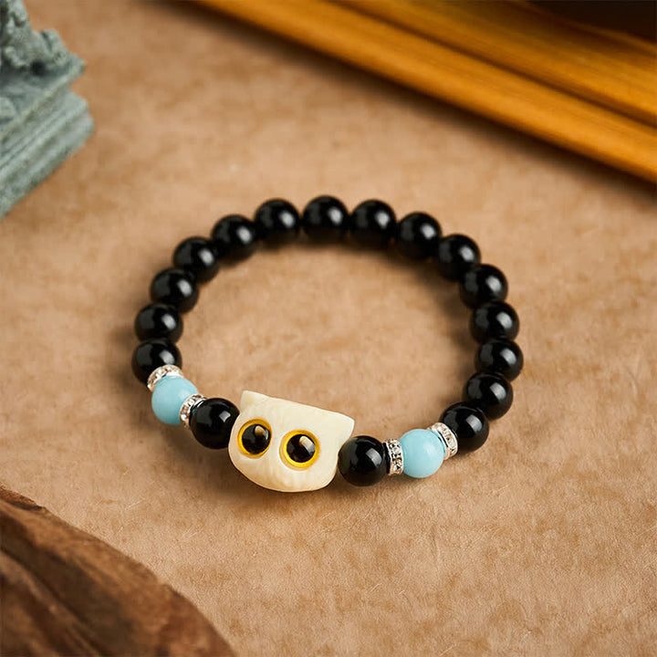 Buddha Stones Bracelet en obsidienne noire sculptée à la main avec perles en relief représentant un chat aux grands yeux - image 20