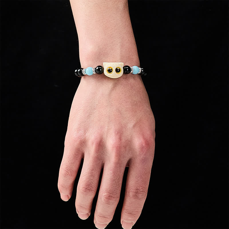 Buddha Stones Bracelet en obsidienne noire sculptée à la main avec perles en relief représentant un chat aux grands yeux - image 19