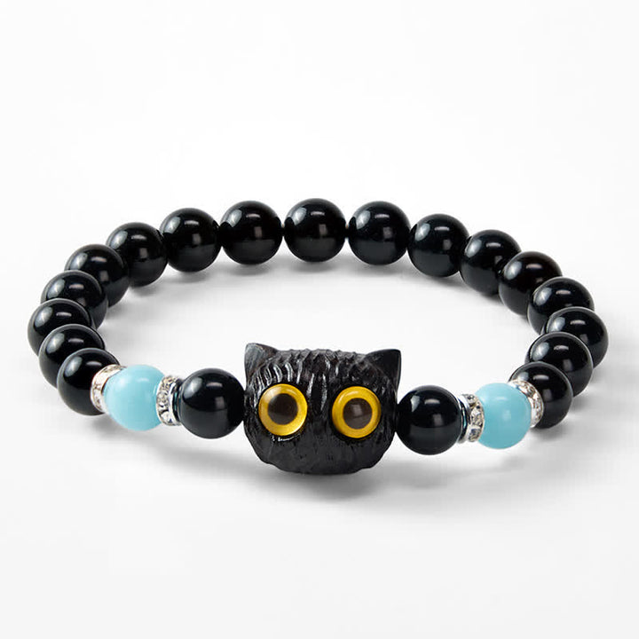 Buddha Stones Bracelet en obsidienne noire sculptée à la main avec perles en relief représentant un chat aux grands yeux - image 14
