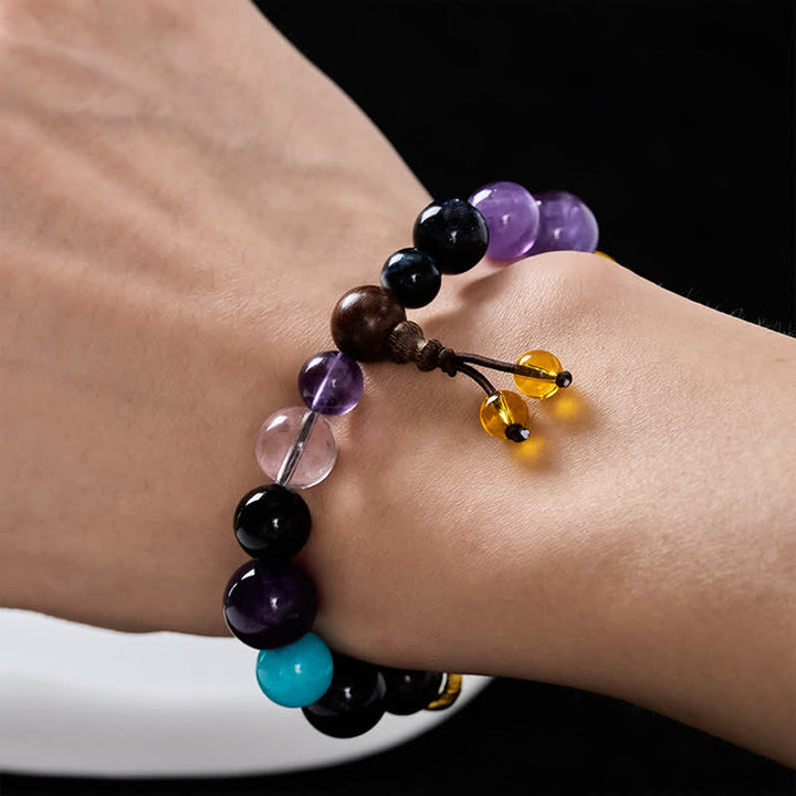 Buddha Stones Bracelet tibétain d'équilibre à 18 perles d'améthyste et d'œil de tigre - image 5