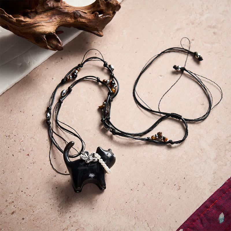 Buddha Stones Collier de paix en résine noire et marron avec perles et fleur de chat. - image 9
