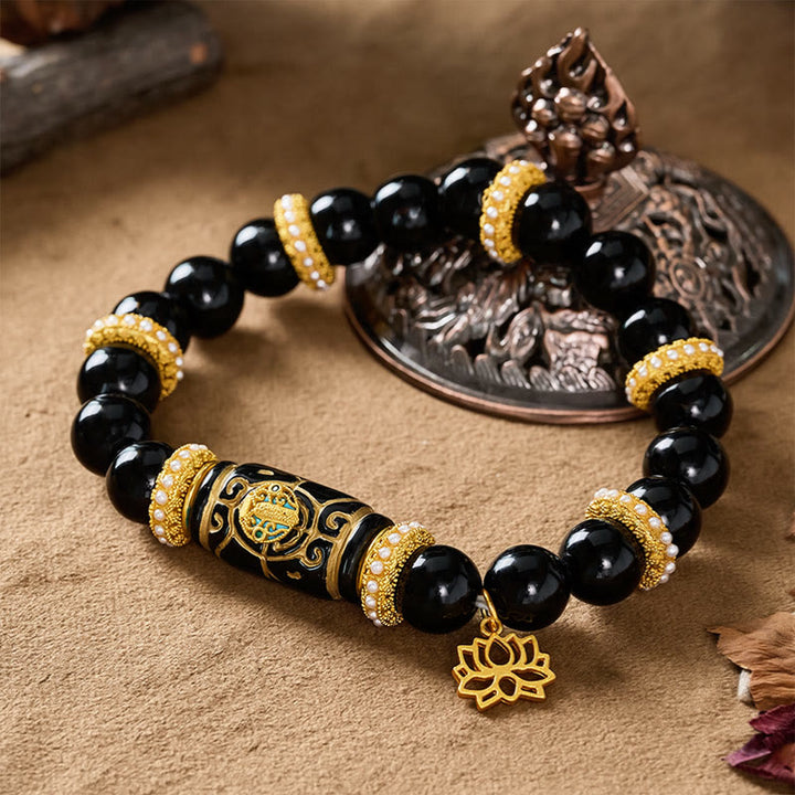 Buddha Stones Bracelet de protection à perles rondes en résine d'obsidienne noire et pendentif lotus - image 3