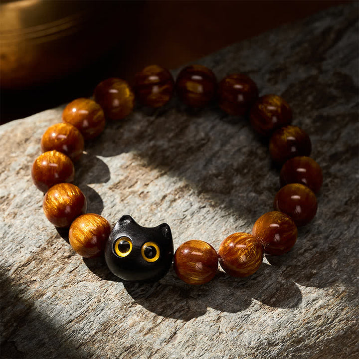 Buddha Stones Bracelet « Chat Calme » en perles de résine jaune, yeux jaunes et bois d'ébène - image 3