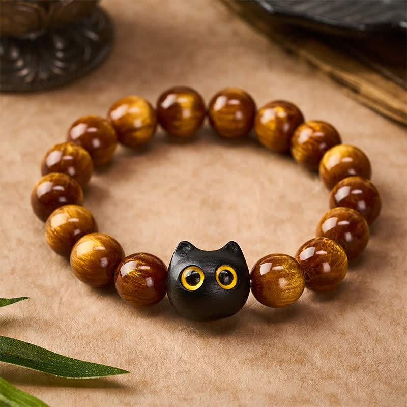 Buddha Stones Bracelet « Chat Calme » en perles de résine jaune, yeux jaunes et bois d'ébène - image 1