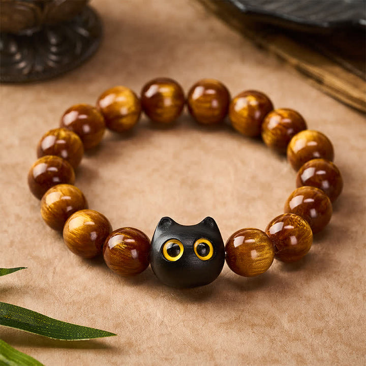 Buddha Stones Bracelet « Chat Calme » en perles de résine jaune, yeux jaunes et bois d'ébène - image 1