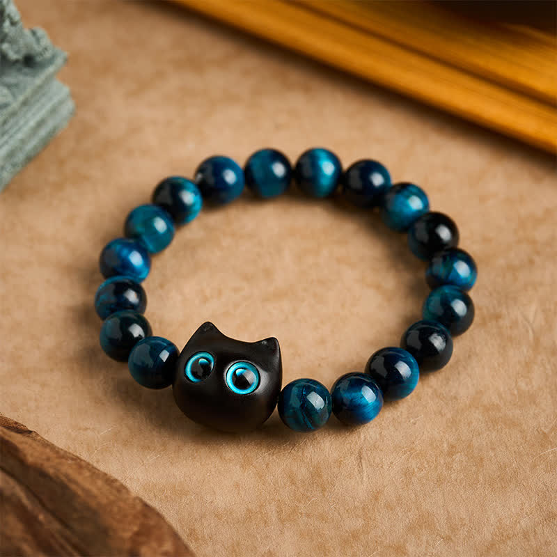 Buddha Stones Bracelet de force féline en bois d'ébène et œil de tigre bleu - 10 mm (Tour de poignet : 6,3-6,7 po / 16-17 cm) - image 0
