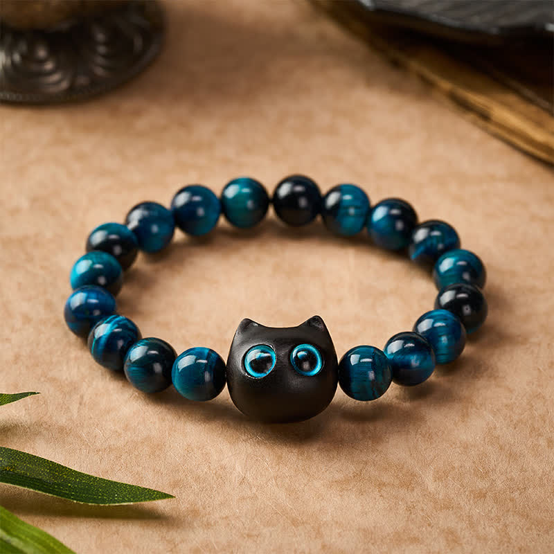 Buddha Stones Bracelet de force féline en bois d'ébène et œil de tigre bleu - image 1