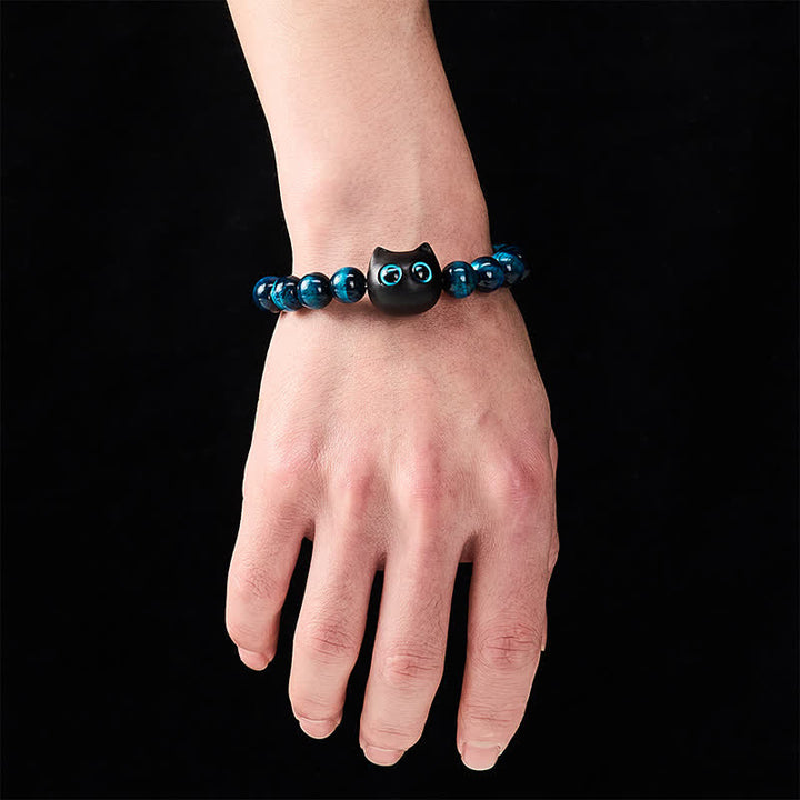 Buddha Stones Bracelet de force féline en bois d'ébène et œil de tigre bleu - image 4