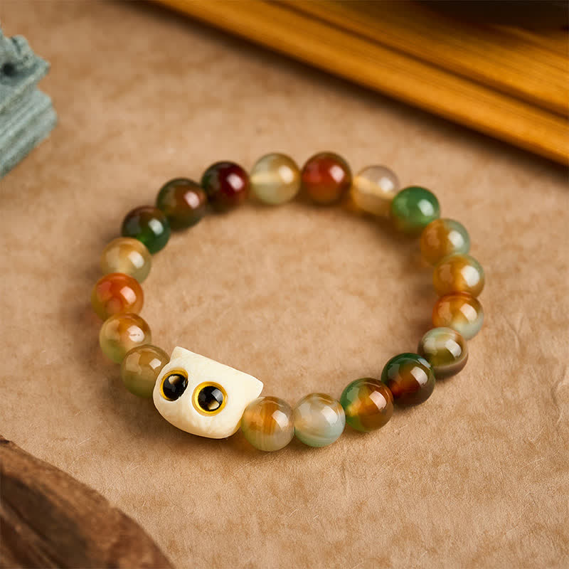 Buddha Stones Bracelet en agate paon, ivoire et fruit, symbole de courage et de chat - 10 mm (Tour de poignet : 6,3-6,7 po / 16-17 cm) - image 0