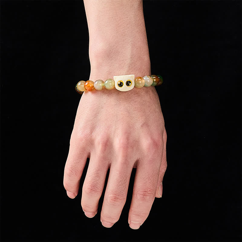 Buddha Stones Bracelet en agate paon, ivoire et fruit, symbole de courage et de chat - image 4