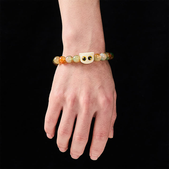 Buddha Stones Bracelet en agate paon, ivoire et fruit, symbole de courage et de chat - image 4