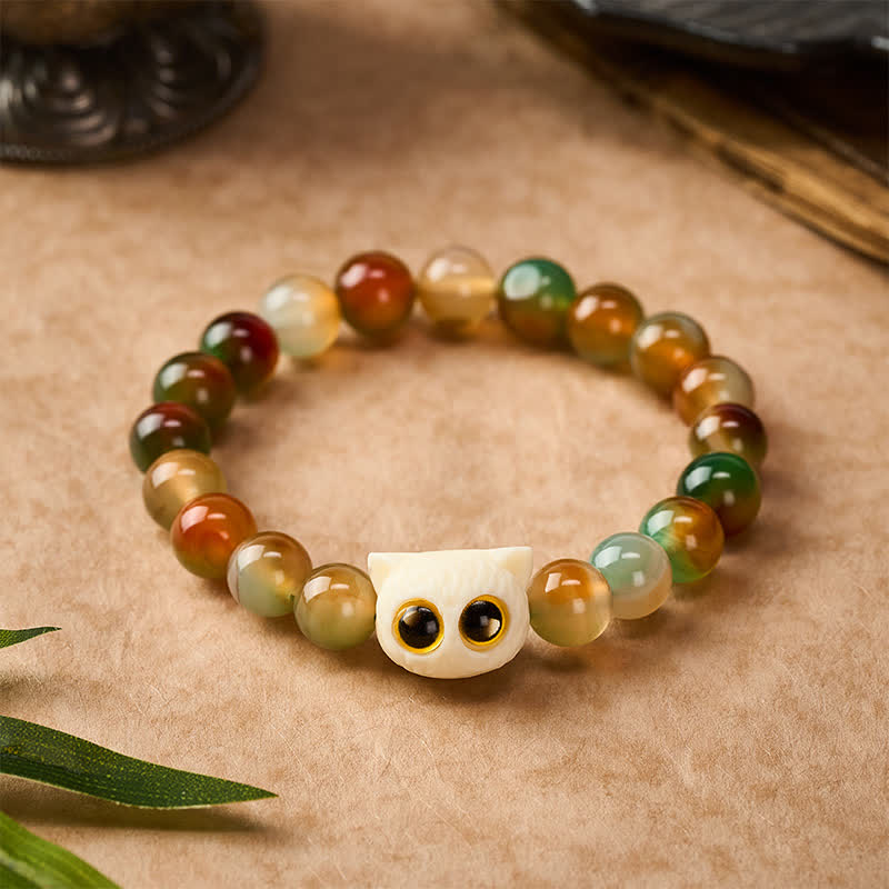 Buddha Stones Bracelet en agate paon, ivoire et fruit, symbole de courage et de chat - image 1