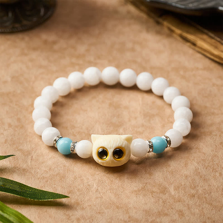Buddha Stones Bracelet de pureté en perles d'obsidienne noire et de calcédoine blanche à tête de chat aux grands yeux - image 3