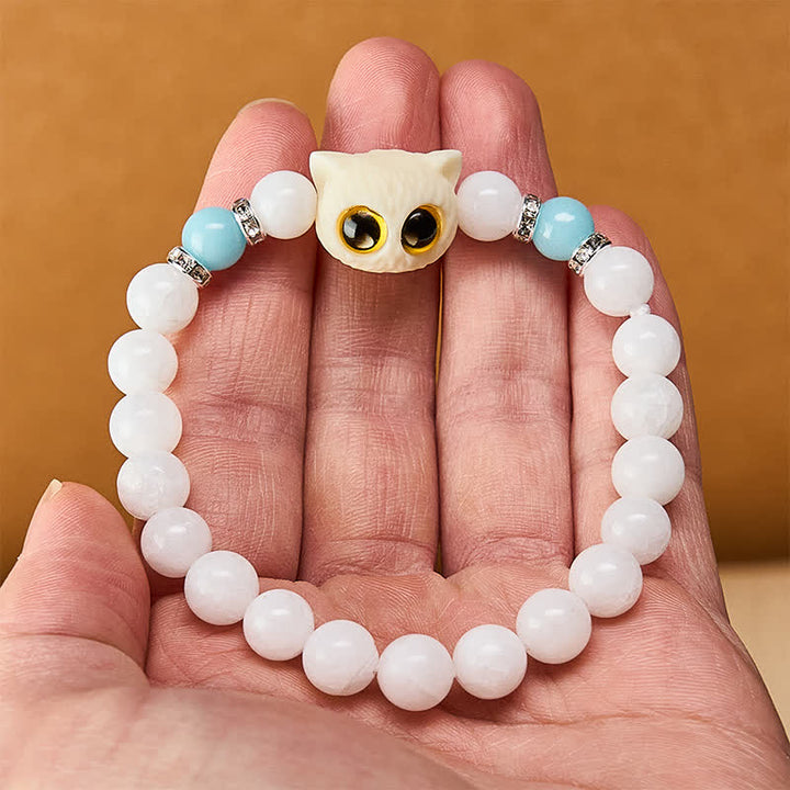 Buddha Stones Bracelet de pureté en perles d'obsidienne noire et de calcédoine blanche à tête de chat aux grands yeux - image 6