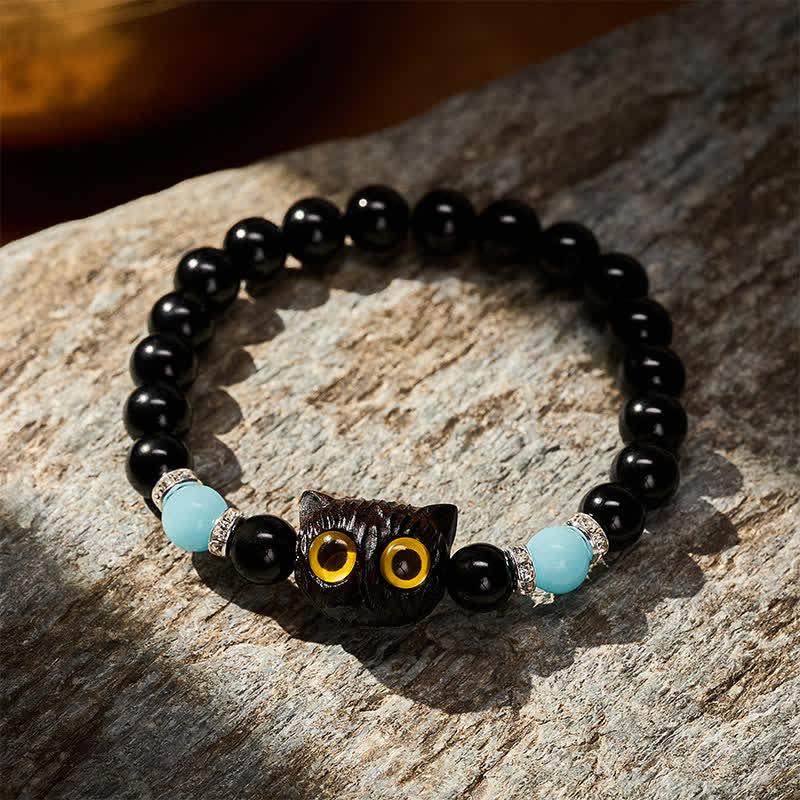 Buddha Stones Bracelet de pureté en perles d'obsidienne noire et de calcédoine blanche à tête de chat aux grands yeux - image 21