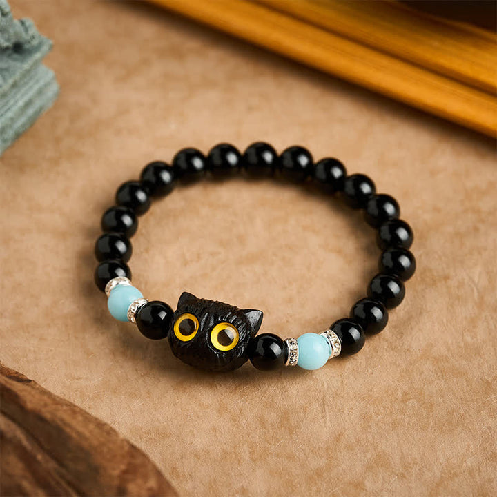 Buddha Stones Bracelet de pureté en perles d'obsidienne noire et de calcédoine blanche à tête de chat aux grands yeux - image 16