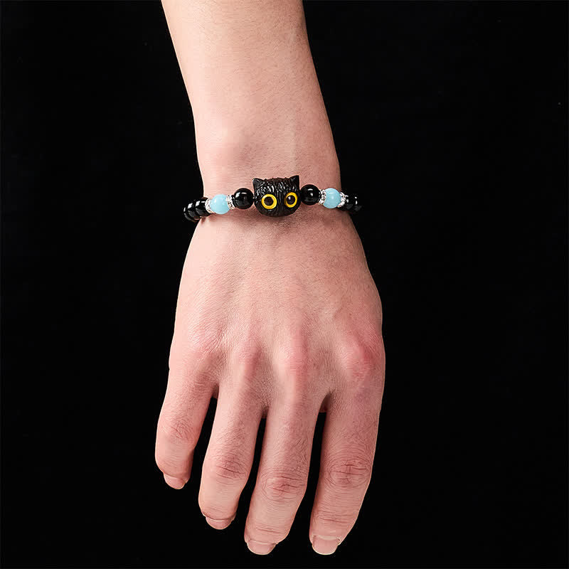 Buddha Stones Bracelet de pureté en perles d'obsidienne noire et de calcédoine blanche à tête de chat aux grands yeux - image 19