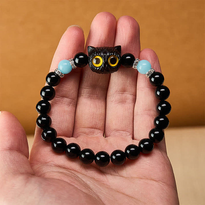Buddha Stones Bracelet de pureté en perles d'obsidienne noire et de calcédoine blanche à tête de chat aux grands yeux - image 20