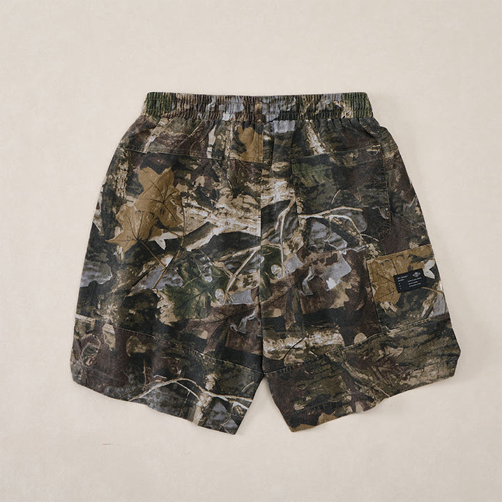 Buddha Stones Short d'été décontracté et athlétique pour homme, en coton ramie, avec cordon de serrage, motif camouflage à feuilles et poches. - image 1
