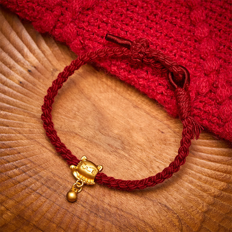 Buddha Stones Bracelet de protection tissé à la main, orné d'un pendentif chat porte-bonheur en cuivre et fil rouge tibétain. - image 1