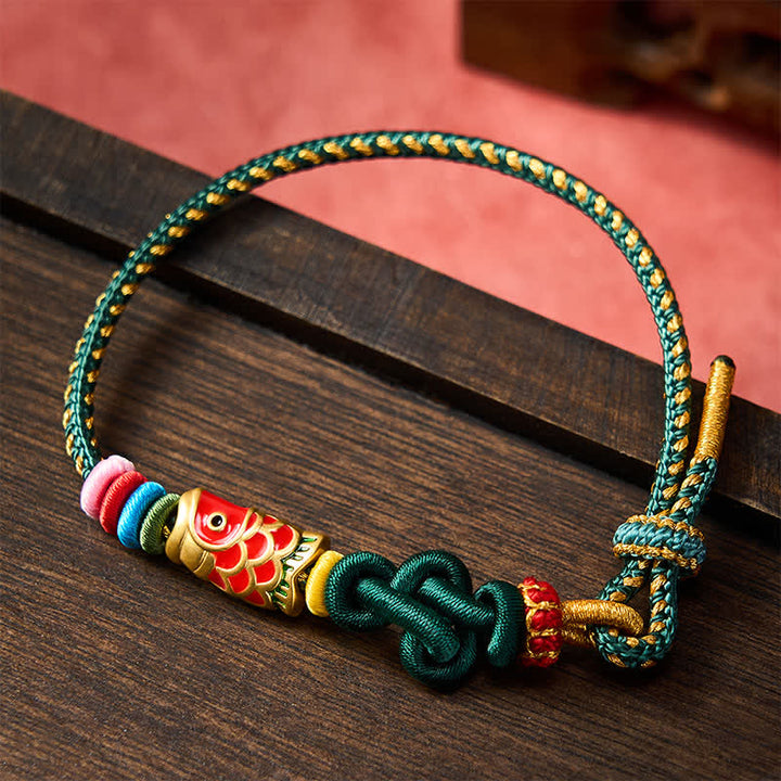 Buddha Stones Bracelet de protection en cordelette vert foncé et jaune tissée à la main, motif carpe koï rouge - image 1