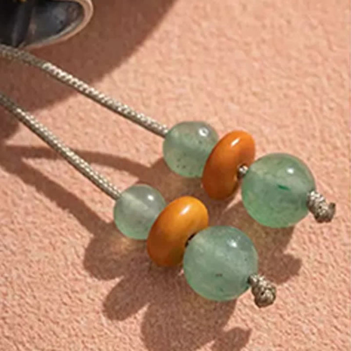 Buddha Stones Porte-clés perlés en cuivre avec sac de bénédiction tissé à la main représentant le personnage Fu - image 14