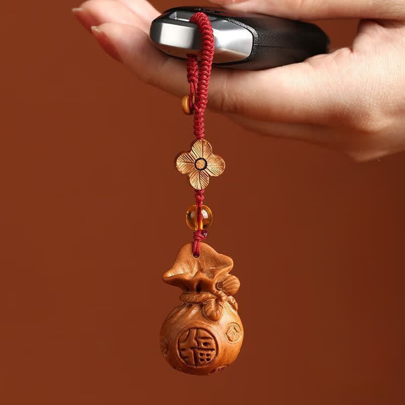 Buddha Stones Porte-clés porte-bonheur en bois de pêcher, motif lotus, avec pochette porte-bonheur - image 4