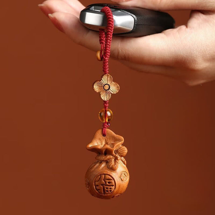 Buddha Stones Porte-clés porte-bonheur en bois de pêcher, motif lotus, avec pochette porte-bonheur - image 4