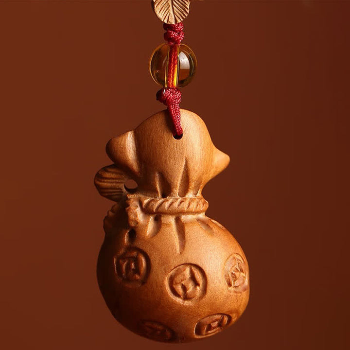 Buddha Stones Porte-clés porte-bonheur en bois de pêcher, motif lotus, avec pochette porte-bonheur - image 3