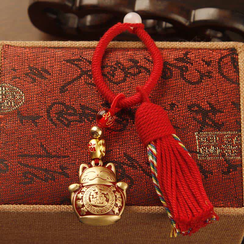 Buddha Stones Porte-clés pompon de bénédiction en laiton tressé à la main avec ficelle rouge représentant le personnage Fu - image 1