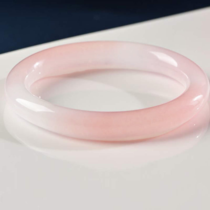Bracelet jonc amour et chaleur en cristal rose Buddha Stones - image 9