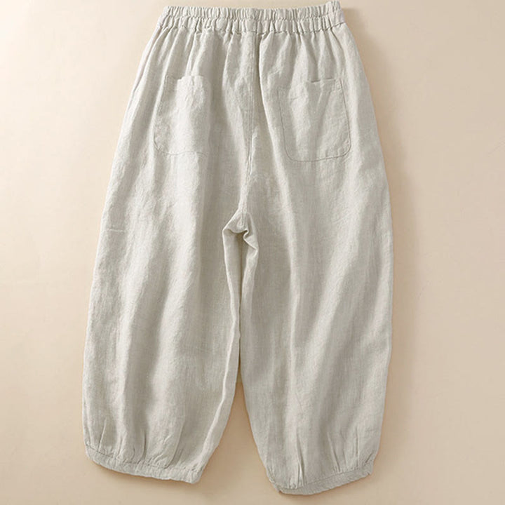 Pantalon harem ample à cordon de serrage et poches, couleur unie, motif floral et Buddha Stones - image 1