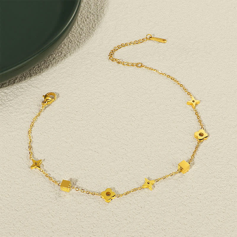 Buddha Stones Bracelet de cheville élégant en acier titane avec breloque florale et stimulation. - image 1