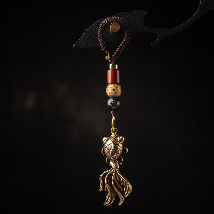 Buddha Stones Breloque en laiton en forme de poisson koi pour porte-clés de richesse - Porte-clés Poisson Koi (Dimensions du pendentif : 33 x 22 x 0,8 mm) - image 0