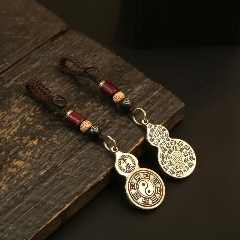 Buddha Stones Porte-clés amulette de protection en forme de calebasse Bagua en laiton Pi Xiu, ornée de cinq pièces impériales - image 0