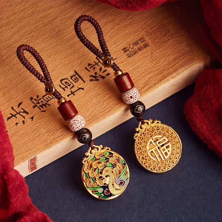 Buddha Stones Porte-clés vintage en cuivre avec le personnage de Peacock Fu - image 0