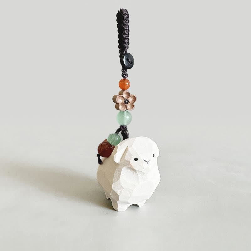 Buddha Stones Porte-clés sculptés à la main en bois de tilleul, motif agneau Om Mani Padme Hum et prune - Agneau - Fleur de prunier - image 0